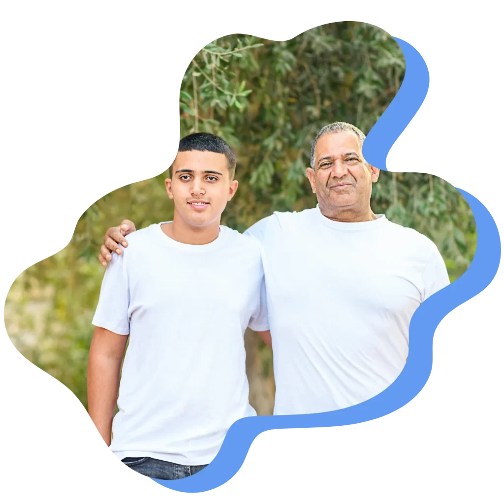 NDIS referrals: Father and son both smiling at camera